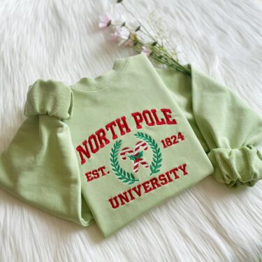 North Pole University Christmas Embroidered Shirt, Crewneck Sweatshirt, Hoodie, T-shirt